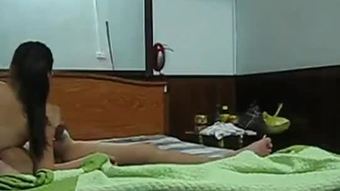 Hidden Cam caught Filipina room service masseur giving Handjob and Blowjob.